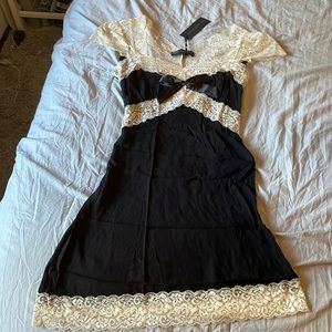Dollskill black lace mini dress